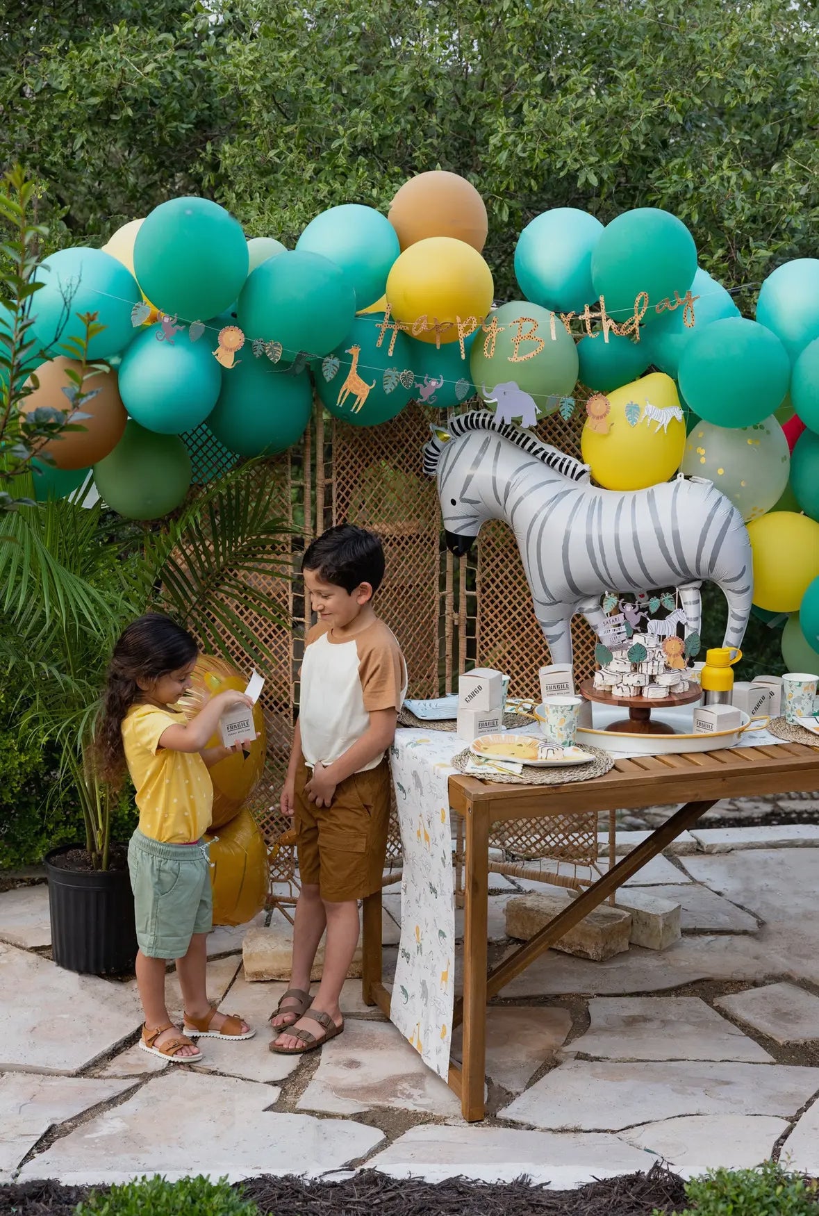 Safari-themed favor boxes designed to resemble cargo boxes, perfect for birthday party treats. Includes 8 closable boxes, each measuring 3 inches tall, wide, and deep. Add adventure to your celebrations with these fun and functional treat boxes.