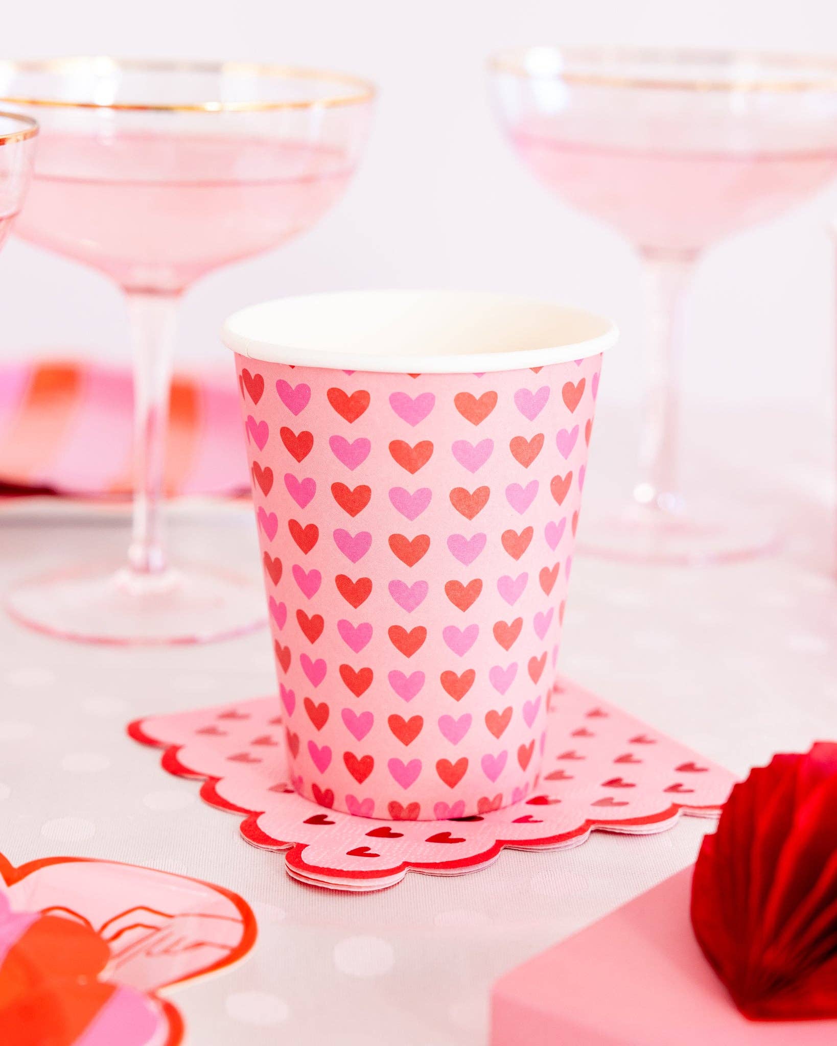 Scalloped Hearts Cocktail Napkins, featuring scalloped edges and playful heart designs, perfect for Valentine's Day parties or celebrations.