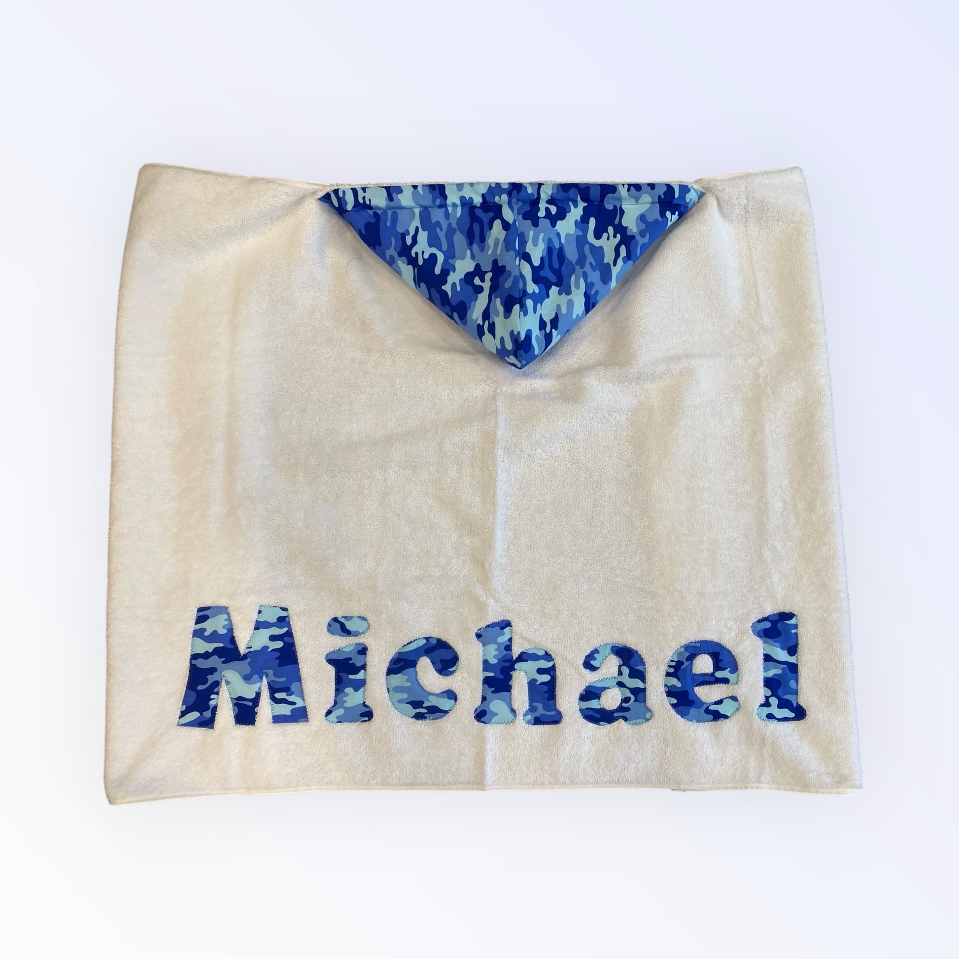 Custom hooded towel for boys in soft, absorbent cotton with a personalized name or design. Lightweight, durable, and perfect for bath time, beach, or pool days. Dimensions: 30 × 54 inches.