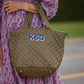 Personalized quilted tote combining practicality and style. Features a unique quilted design and customizable personalization, making it a one-of-a-kind accessory for any occasion. Stay organized and chic with this must-have tote