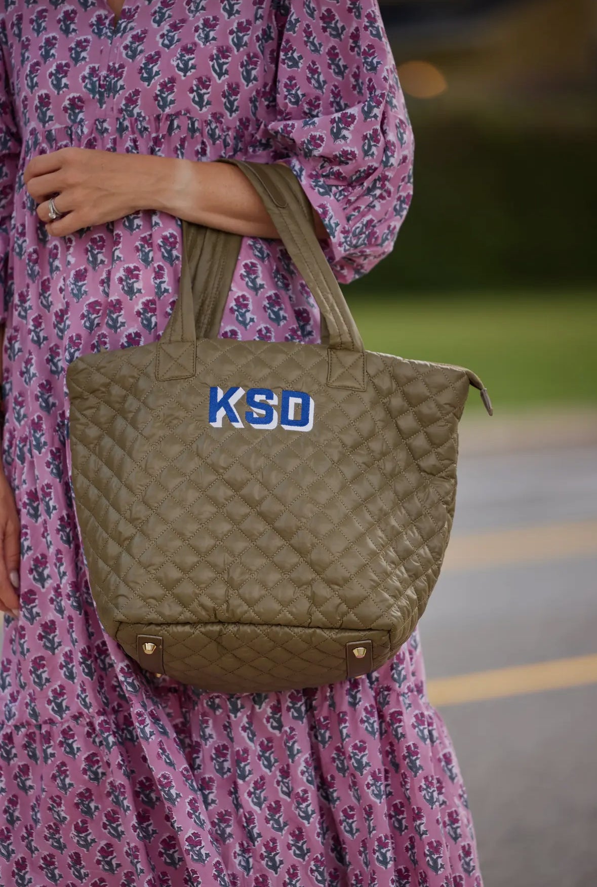 Personalized quilted tote combining practicality and style. Features a unique quilted design and customizable personalization, making it a one-of-a-kind accessory for any occasion. Stay organized and chic with this must-have tote