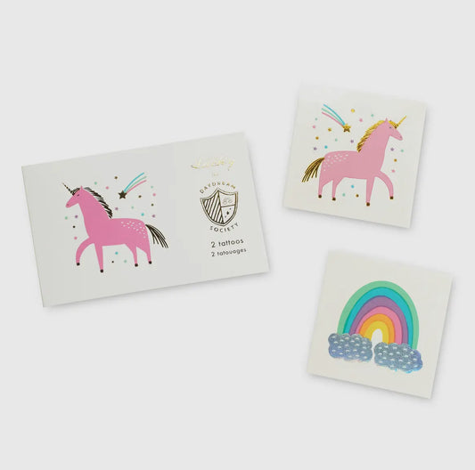 Unicorn and rainbow-themed temporary tattoos with candy-like colors, gold, and holographic silver foil. Illustrated by Hello!Lucky for Daydream Society. Pack includes 2 tattoos (1 of each design), each measuring 2.5 inches square. Safe, non-toxic, and packaged in a card stock envelope