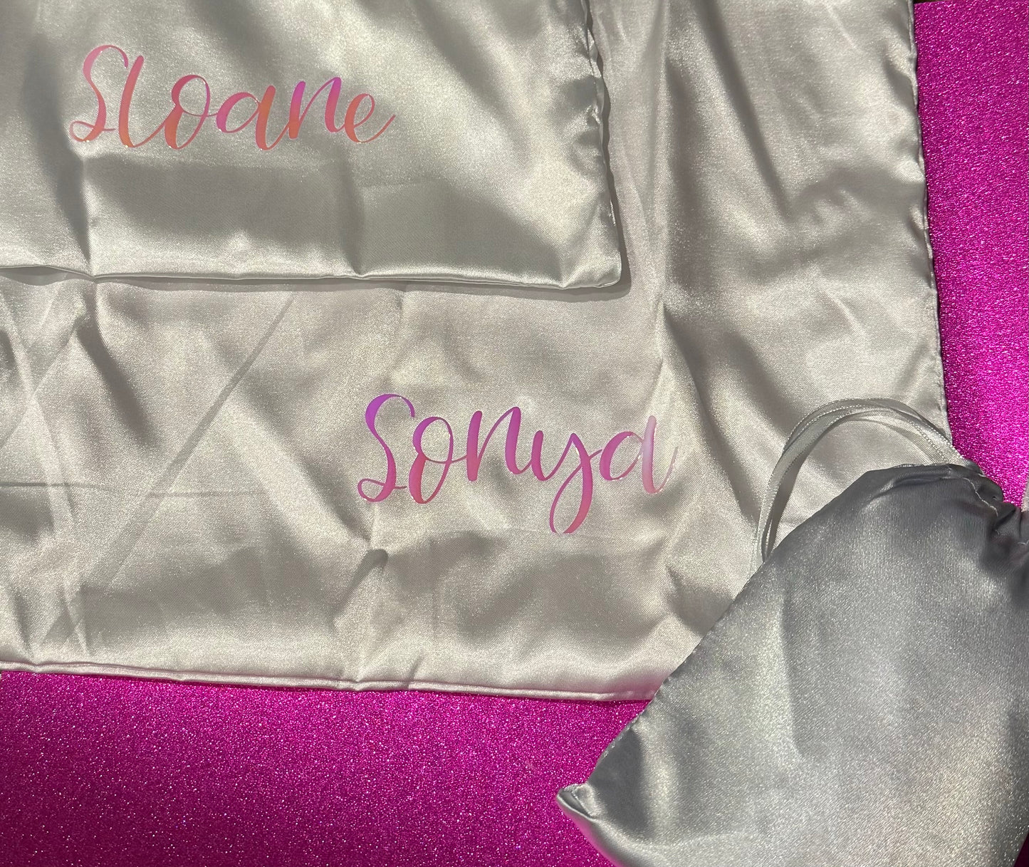 Personalized satin pillowcase made from soft microfiber fabric, perfect for reducing facial creases and wrinkles. Comes in a satin pouch for easy storage.