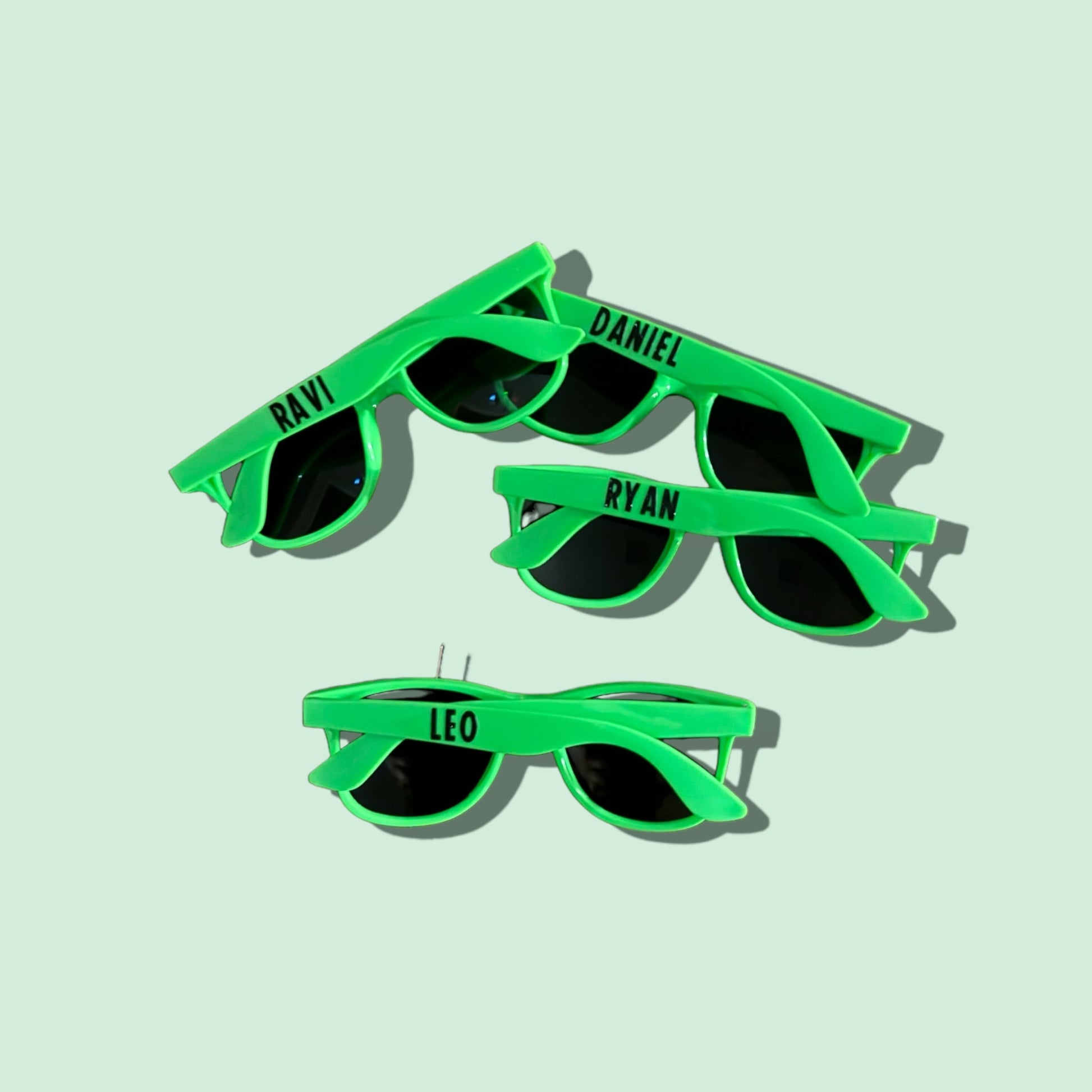 Personalized sunglasses with custom name printing, perfect for making a fashion statement. These trendy shades add personality to any outfit and help you stand out from the crowd. Ideal summer accessory for sunny days and a unique gift for friends.