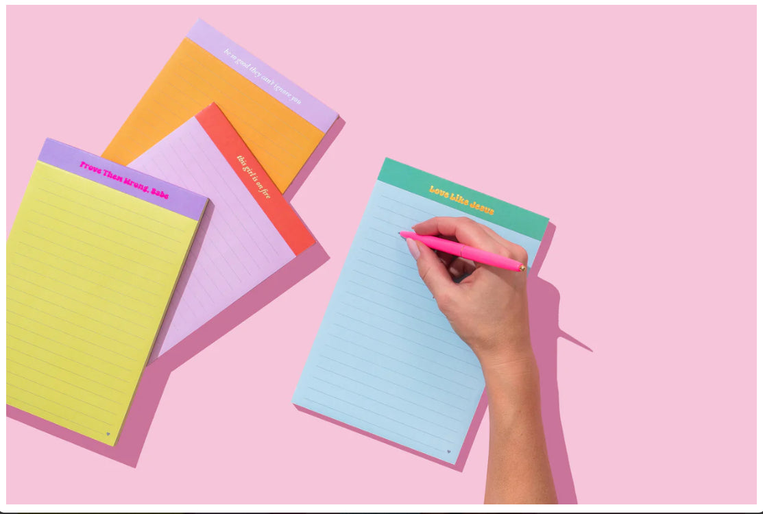 Yellow lined notepad with the motivational phrase 'Prove Them Wrong, Babe' printed in purple at the top. Designed for note-taking and empowering personal messages.