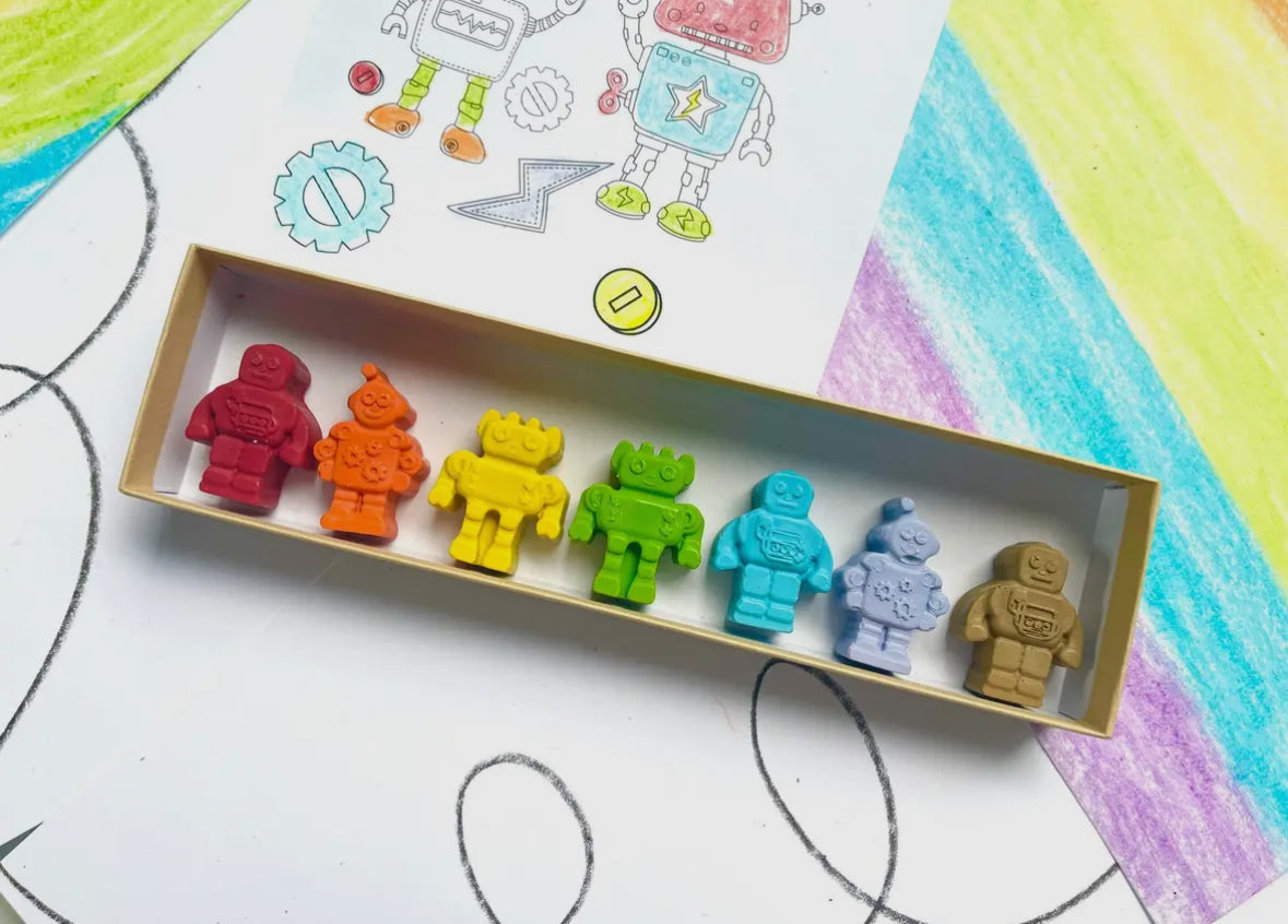 Eco-friendly Robot Crayons made from recycled and upcycled materials, packaged in a stylish box. Great for parties, classrooms, or as unique gifts.