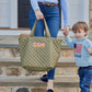 Personalized quilted tote combining practicality and style. Features a unique quilted design and customizable personalization, making it a one-of-a-kind accessory for any occasion. Stay organized and chic with this must-have tote