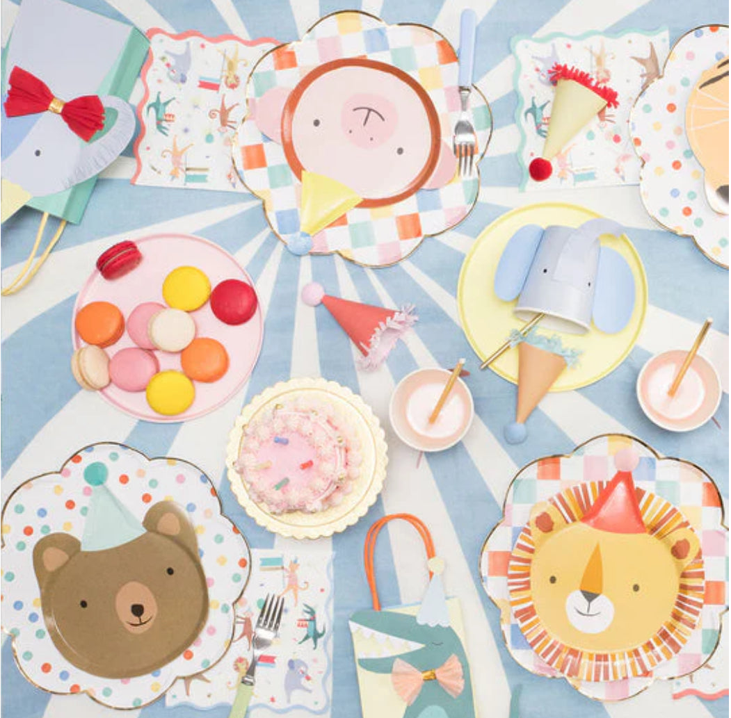 Adorable animal plates designed for children's parties, featuring bright colors and fun pompom printed details. Each plate is shaped like a bear, monkey, tiger, or lion, crafted from premium 400 gsm paper and made from sustainable FSC paper. Pack contains 8 plates in 4 designs.