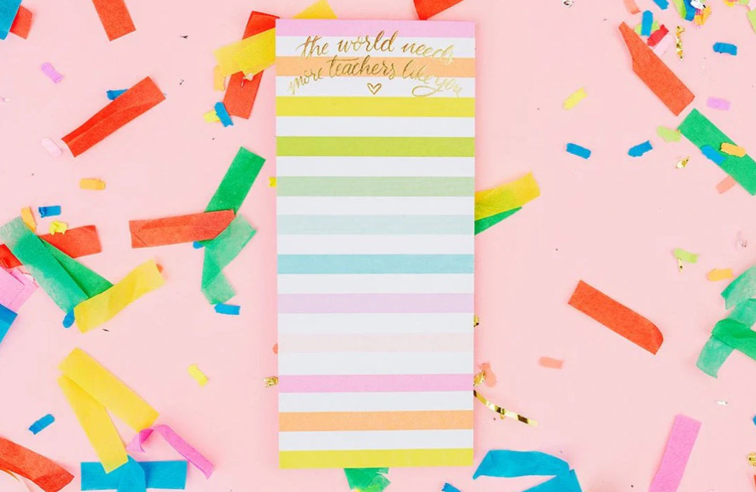 Colorful 3.5" x 8" list pad with gold foil imprinting and the message 'The World Needs More Teachers Like You.' Features 50 sheets, a magnet on the back, and shrink-wrap packaging. Makes a thoughtful gift for teachers.