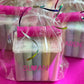 Personalized chalk bucket with 20 pieces of non-toxic chalk, featuring a handle and optional chalk holder. Ideal for outdoor fun or classrooms, easy to clean with water. Includes custom label and wrapping. Perfect for party favors or gifts.