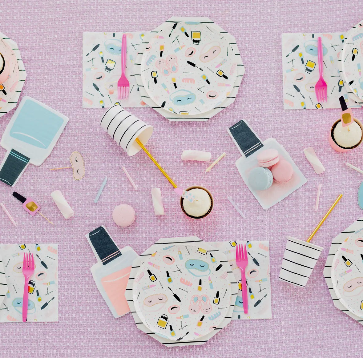 Slumber party nail polish bottle-shaped napkins with neon accents, perfect for sleepover and spa-themed parties. Illustrated by Hello!Lucky for Daydream Society. Includes 16 napkins, 4 of each color, measuring 6.5 inches wide by 8.25 inches tall. Not microwave safe.