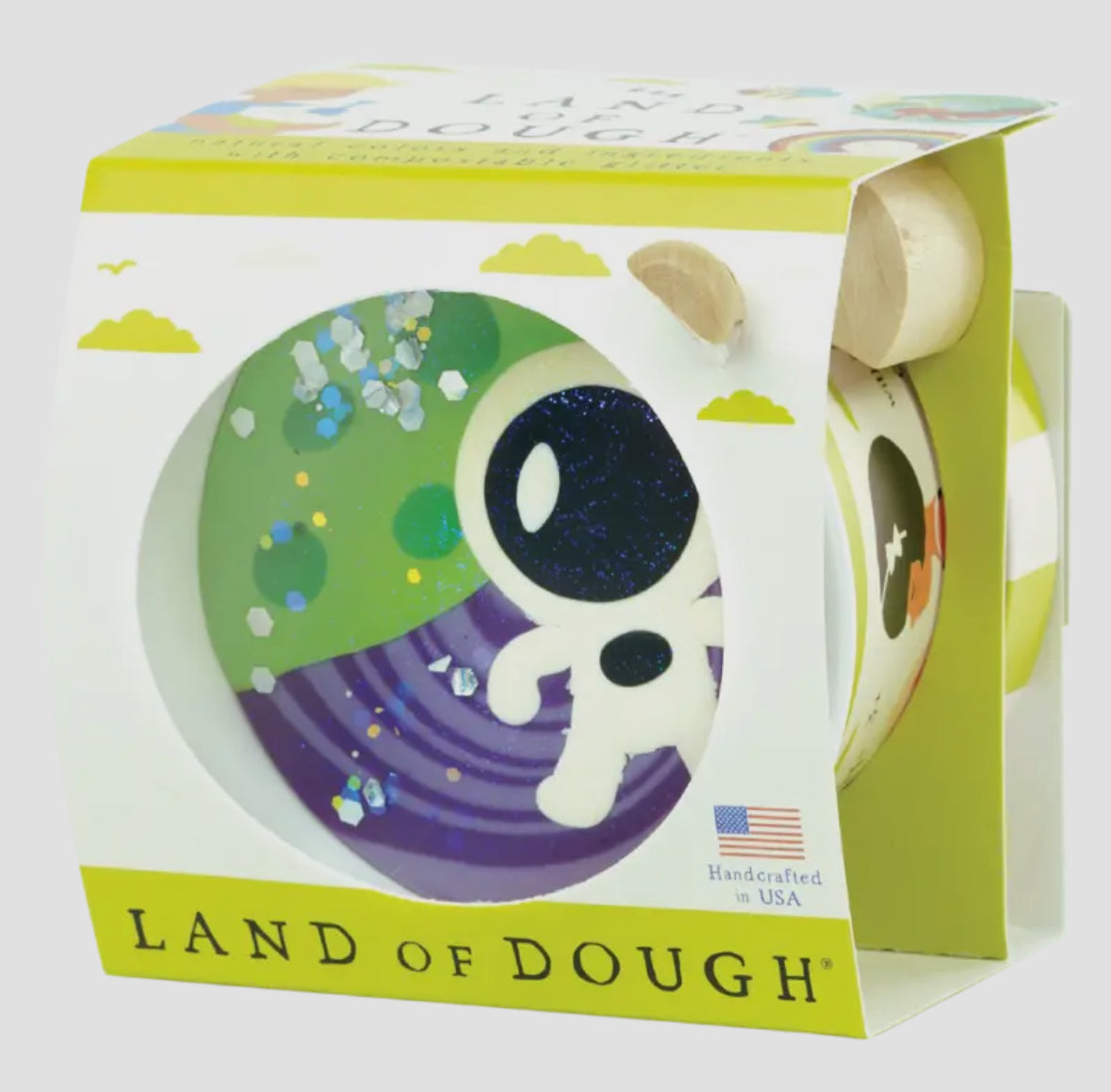 Land of Dough natural sculpting dough with coconut oil and essential oils, perfect for little hands to shape and create. Includes 7oz carton with a wooden spoon. Colors include pink, blue green, and light blue with compostable glitter. Reusable and air-dryable