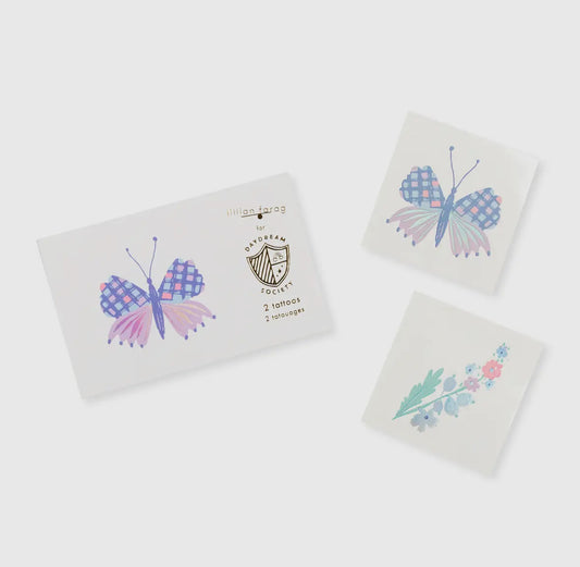 Beautiful holographic silver foil butterfly tattoos, illustrated by Lillian Farag for Daydream Society. Includes 2 designs, each 2.5 inches square. Safe, non-toxic, and packaged in a cardstock envelope.