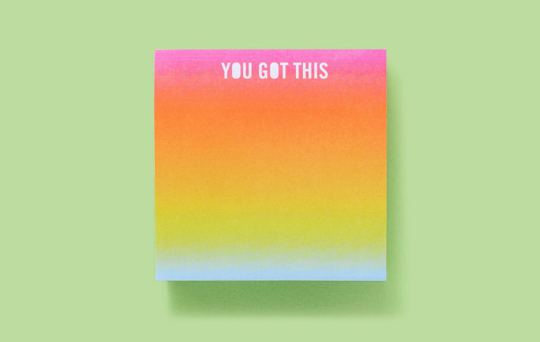 Colorful sticky notes measuring 3.5" x 3.5", featuring the inspirational phrase 'You Got This.' Each pad includes 300 sheets with a sticky adhesive backing, shrink-wrapped for packaging. Perfect for adding fun to your workday. 