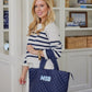 Personalized quilted tote combining practicality and style. Features a unique quilted design and customizable personalization, making it a one-of-a-kind accessory for any occasion. Stay organized and chic with this must-have tote