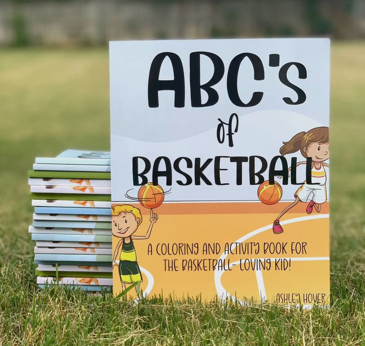 Basketball Coloring Books Party Favors featuring basketball-themed covers, with each book containing over 70 pages for coloring. Perfect for ages 1-8, ideal as birthday party favors, classroom giveaways, and more. Each coloring book measures approximately 11 inches tall by 8.5 inches wide.