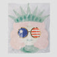 Lady Liberty Sunnies Shaped Paper Plates, perfect for patriotic parties. Includes 8 plates, each 8 x 10 inches. Add a fun and stylish touch to your table setting, letting you enjoy your food with a side of freedom. Ideal for any patriotic gathering.