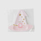 Pink witch hat-shaped disposable plates, perfect for Halloween parties. Pack of 8 plates, measuring 10" x 9", adding a fun and stylish touch to spooky celebrations.