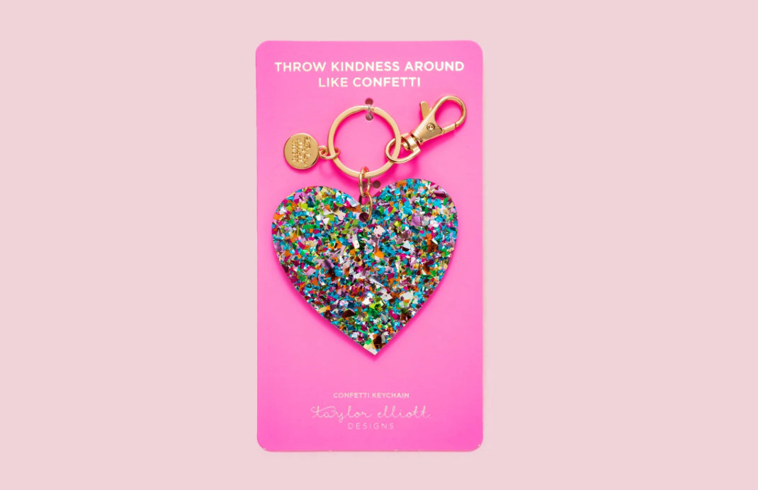 Confetti acrylic heart keychain, 3" x 3" with a gold metal keyring. Perfect for adding to keys, tote bags, or backpacks. Confetti is hand-sprinkled inside the acrylic to prevent shedding. Each piece is unique due to this process. Includes silver hologram foil.