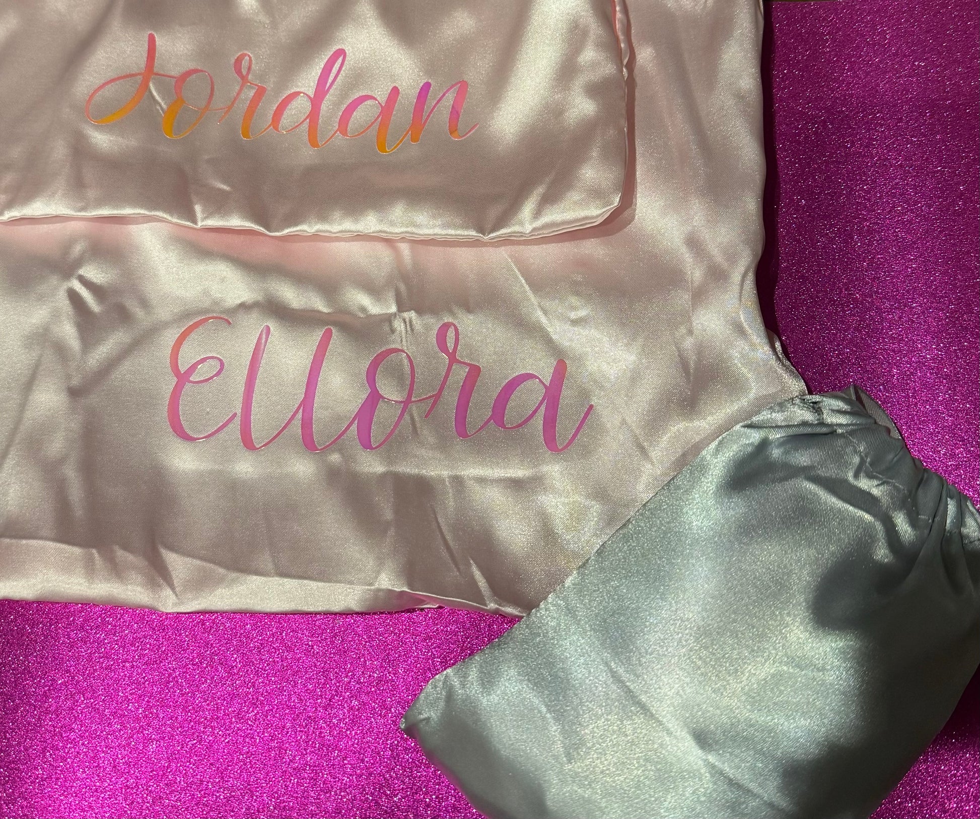 Personalized satin pillowcase made from soft microfiber fabric, perfect for reducing facial creases and wrinkles. Comes in a satin pouch for easy storage.