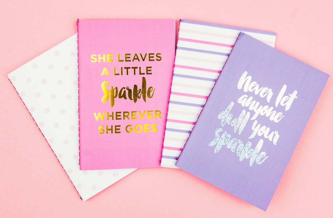 Charming mini notebooks designed for convenience, packaged in shrink-wrap with ribbon. Perfect for jotting down thoughts or sharing with friends.