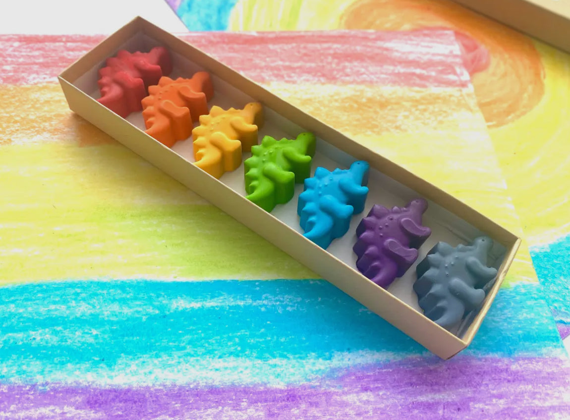 Eco-friendly dinosaur crayons gift set made from recycled materials, featuring 7 non-toxic crayons in assorted colors. Great for parties, holidays, and everyday fun!