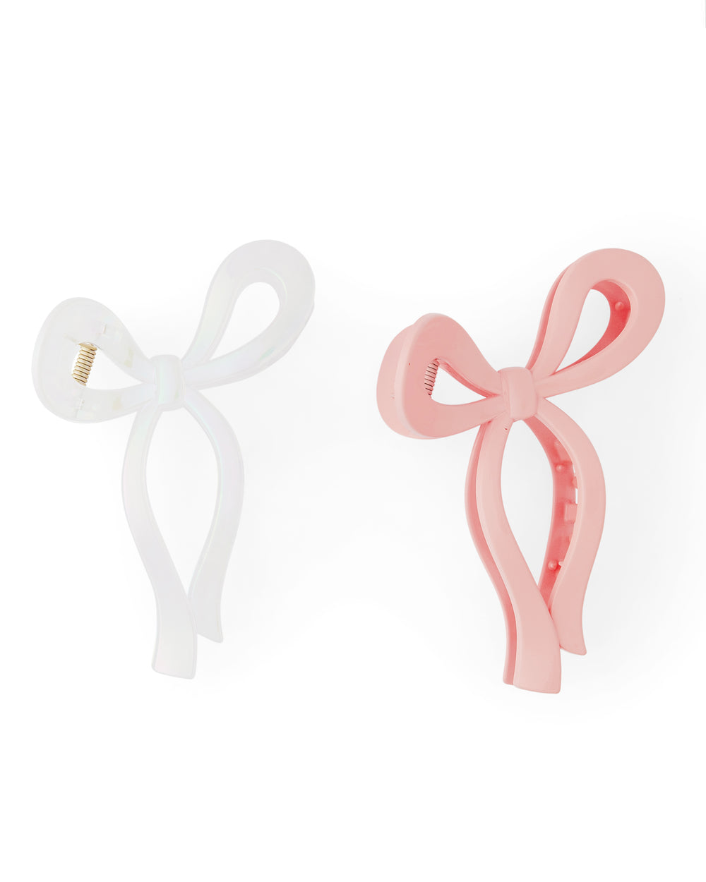 Jumbo bow claw clips in pink and white, trendy and stylish hair accessories for all hair types.