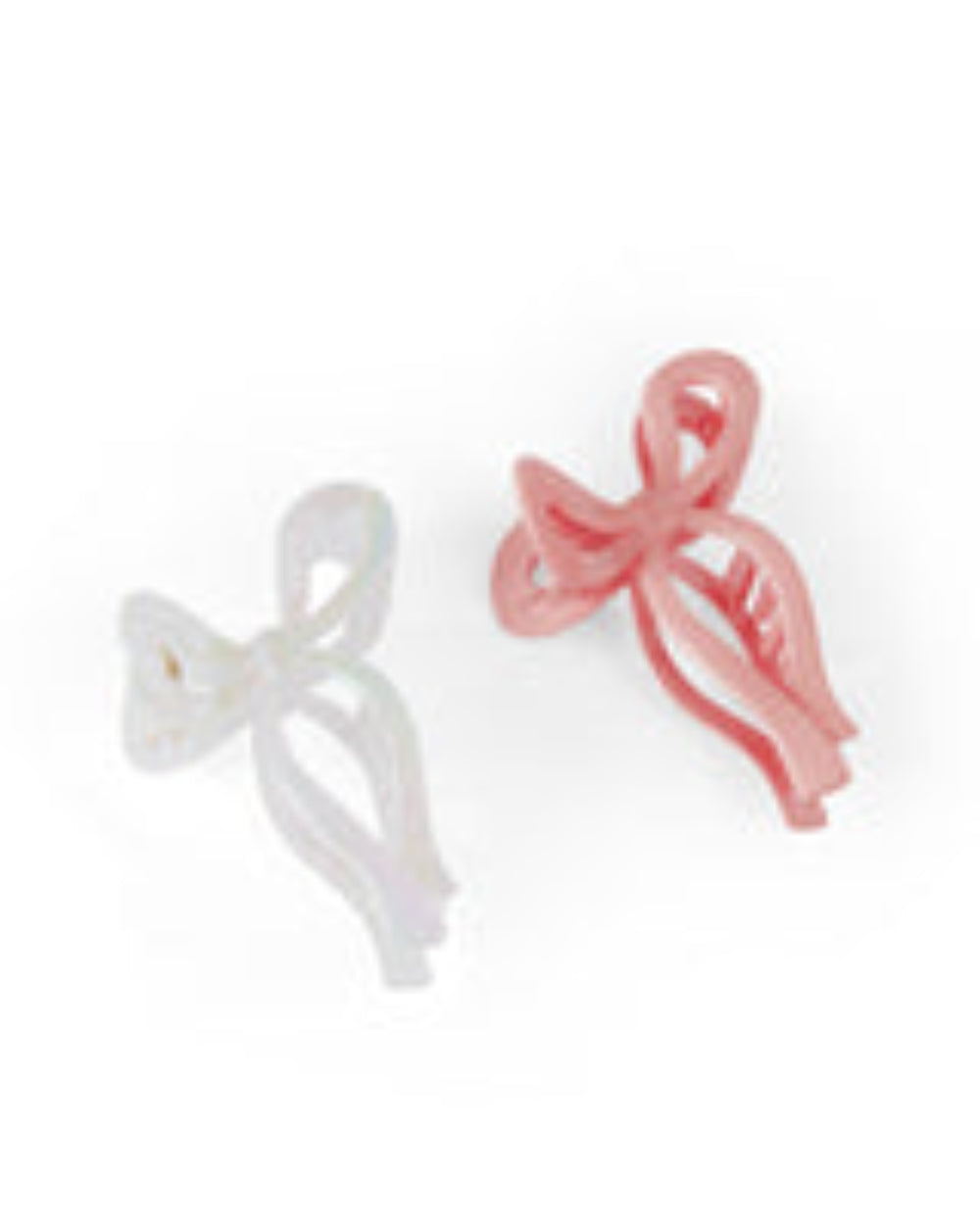 Jumbo bow claw clips in pink and white, trendy and stylish hair accessories for all hair types.