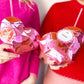 Set of 2 heart-shaped sippers, 20 oz, with spill-proof straw, BPA-free, perfect for parties or cozy moments.