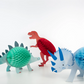 3D Dinosaur Honeycomb Decorations in Red, Blue, and Mint Tissue Paper, Perfect for Party or Bedroom Decor, Simple Self-Assembly Required, Pack of 3 Designs.