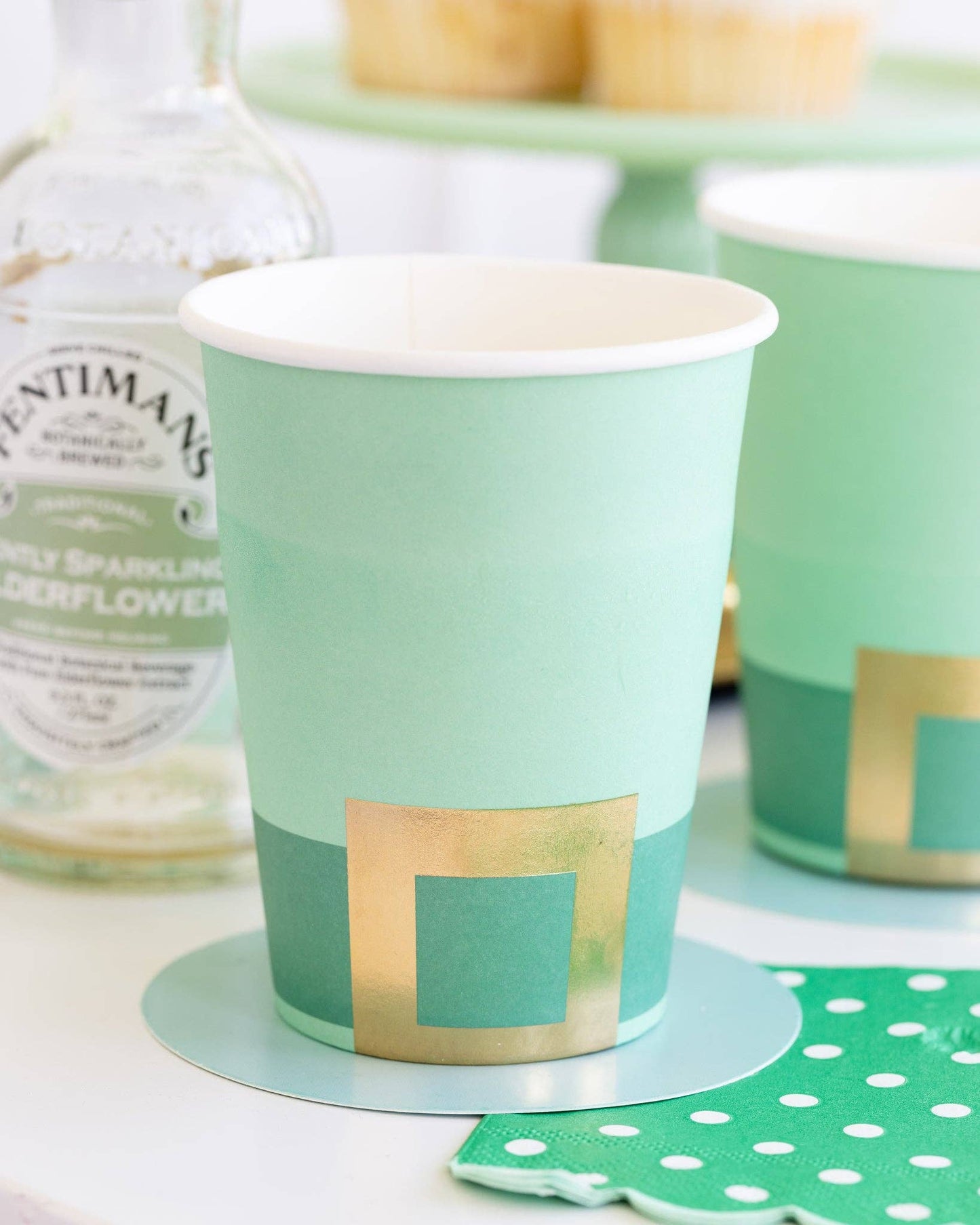 Set of 8 Leprechaun Party Cups – 12oz, 4.5" tall with gold foil and paper hat brim, perfect for St. Patrick's Day.