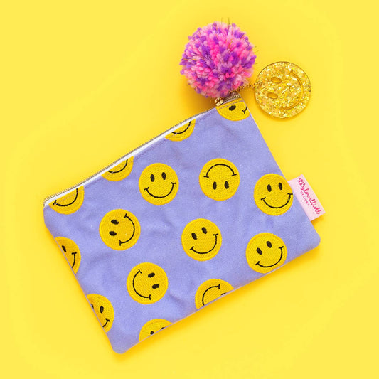 Medium Smiley Pouch: Versatile organizer, makeup bag, or pencil pouch with embroidered smiley, pom-pom details.