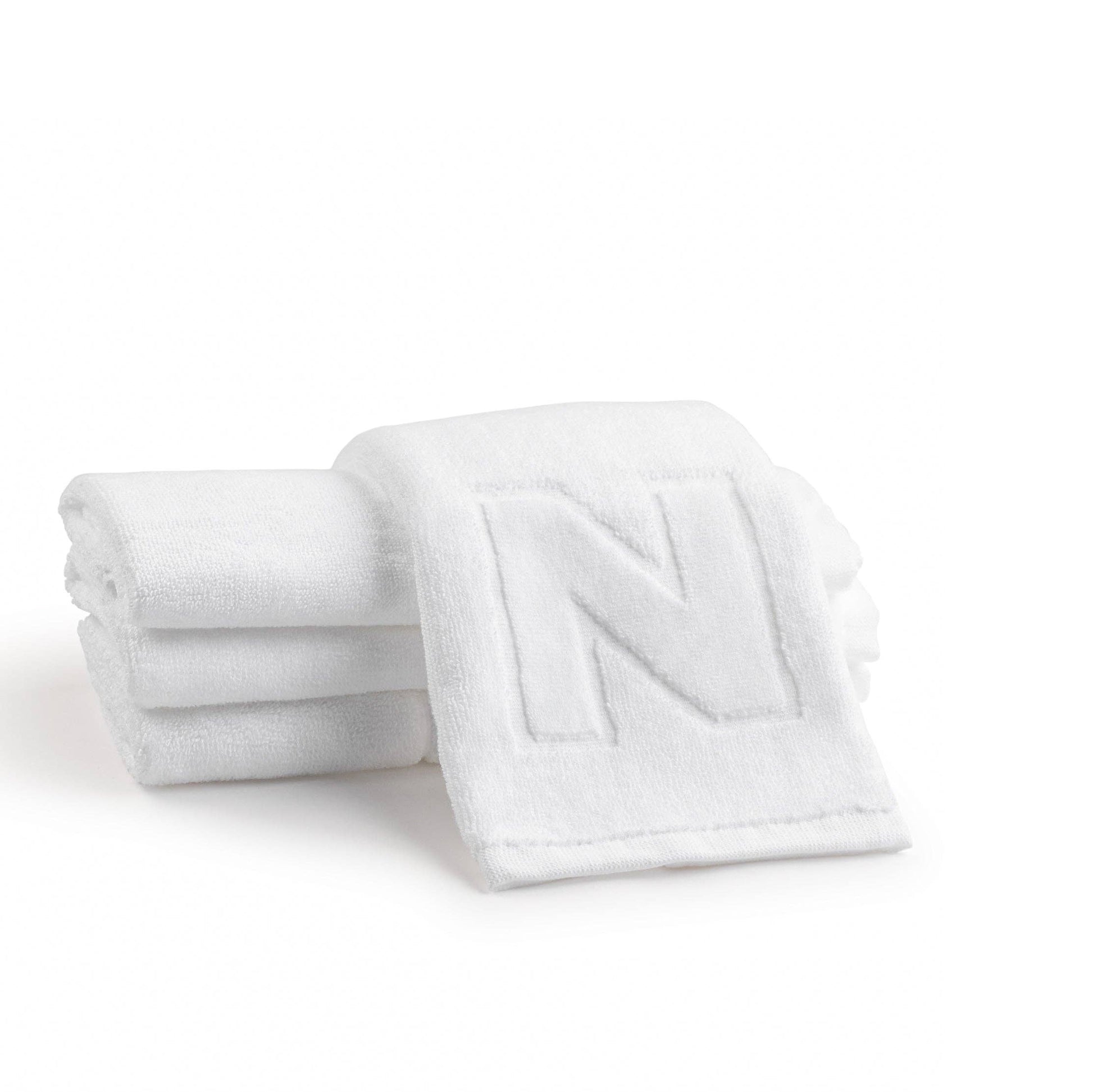 Elegant cotton finger towels with embossed initials, perfect for any room, gift-ready.