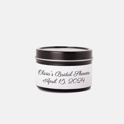 Personalized 4oz candle tins, perfect for bridal shower favors or invitations. Made with hand-poured coconut soy wax, featuring a lead-free cotton wick and custom labels with the bride's name and wedding date. Available in multiple aromatic scents