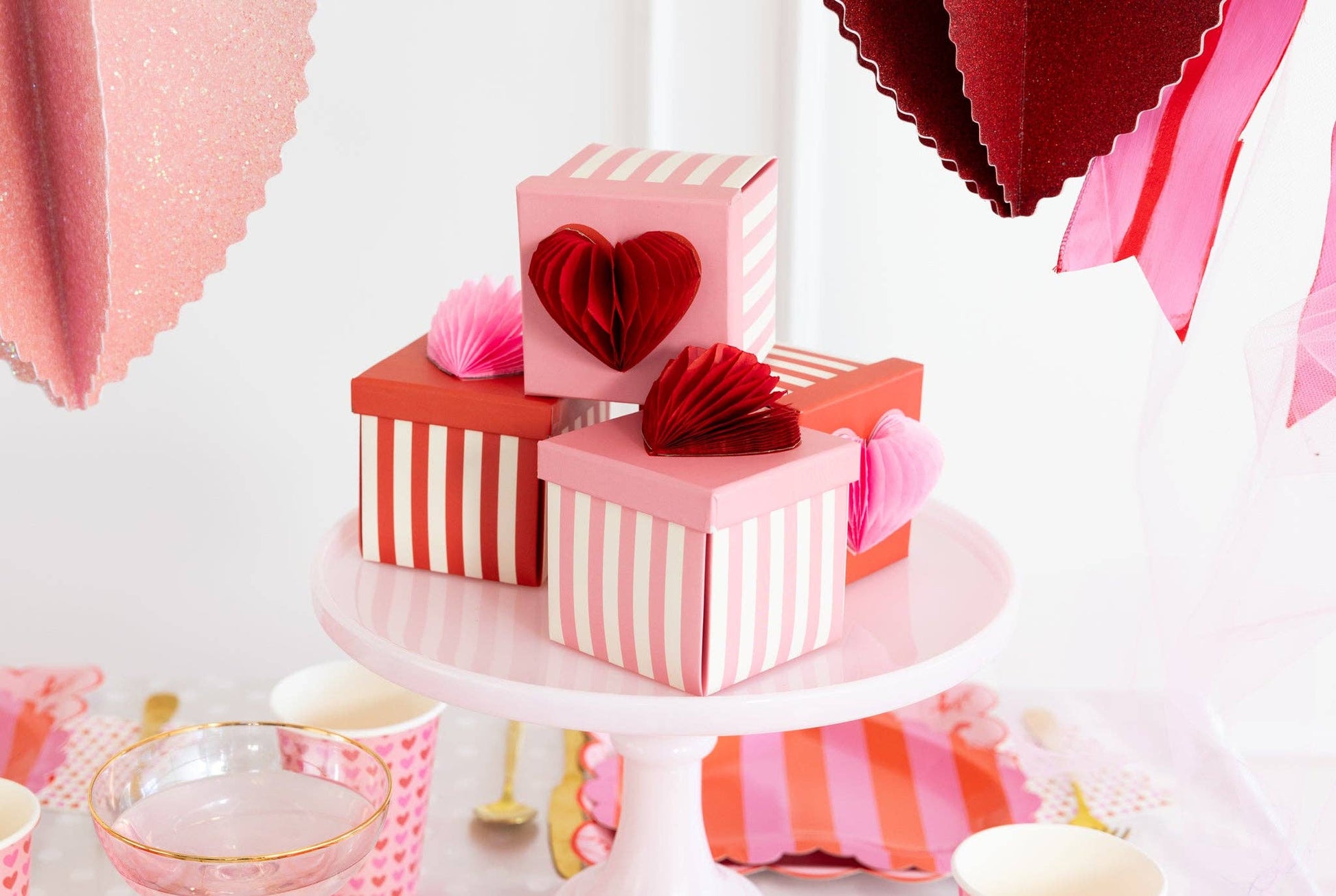 Heart Explosion Treat Box set for Valentine's Day, featuring heart-shaped boxes with a honeycomb heart topper, perfect for gifting treats to loved ones.