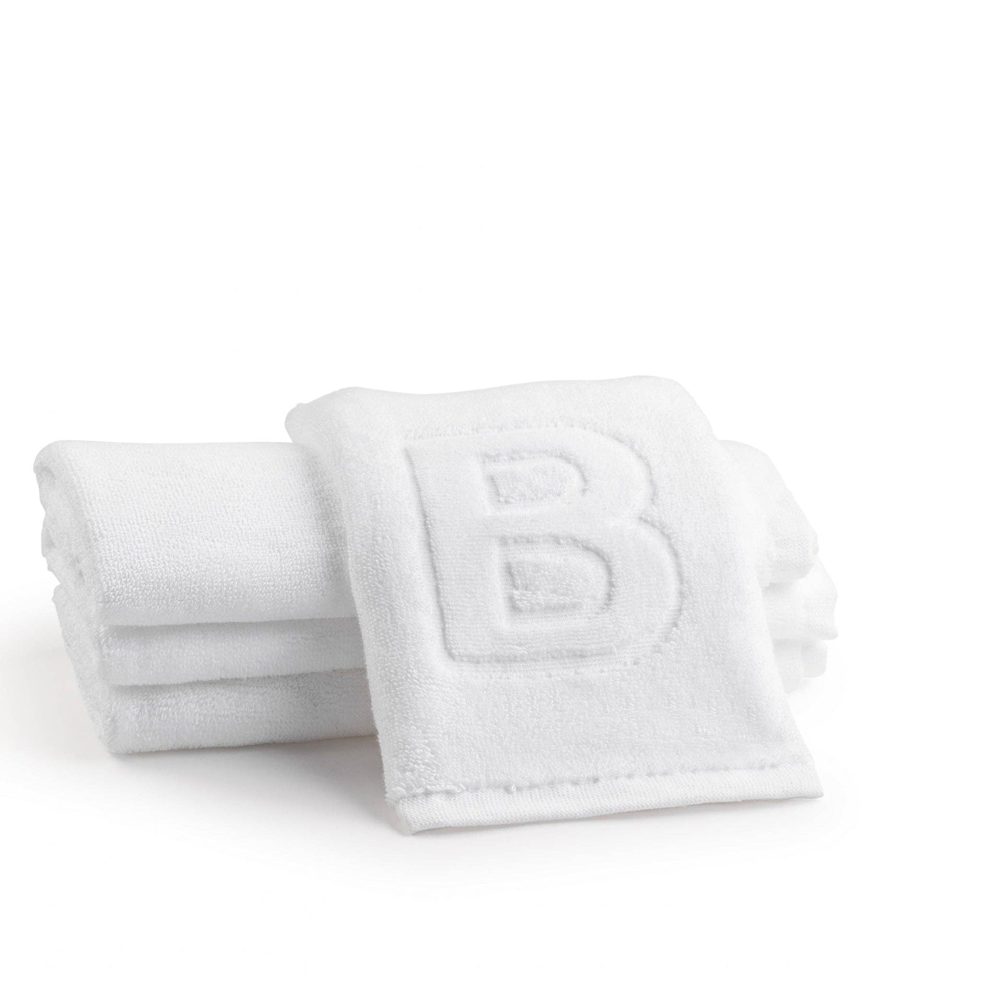 Elegant cotton finger towels with embossed initials, perfect for any room, gift-ready.