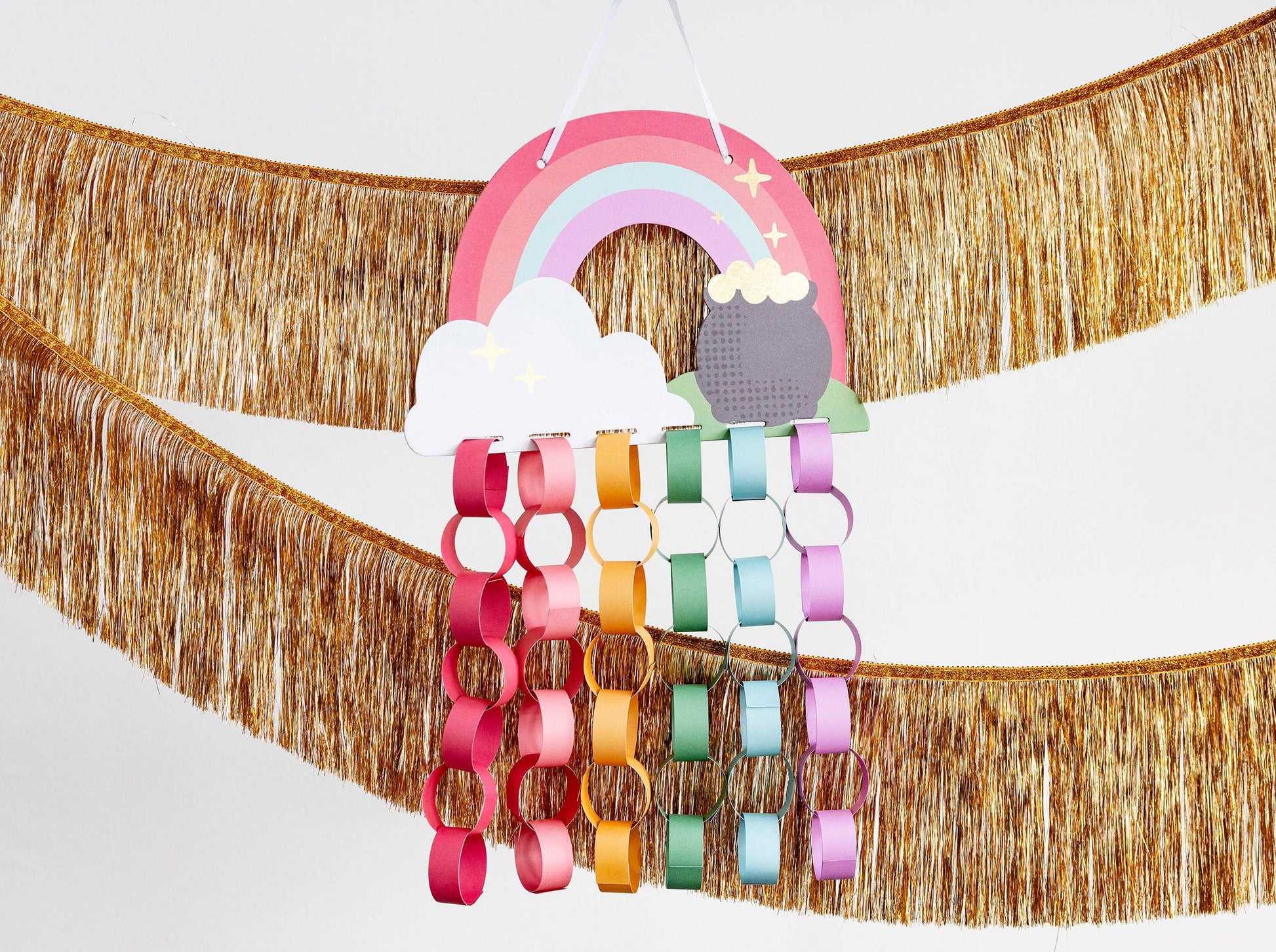 Rainbow Paper Chain Project – includes chipboard rainbow, ribbon, 48 paper pieces with gold foil, perfect for St. Patrick's Day crafts.