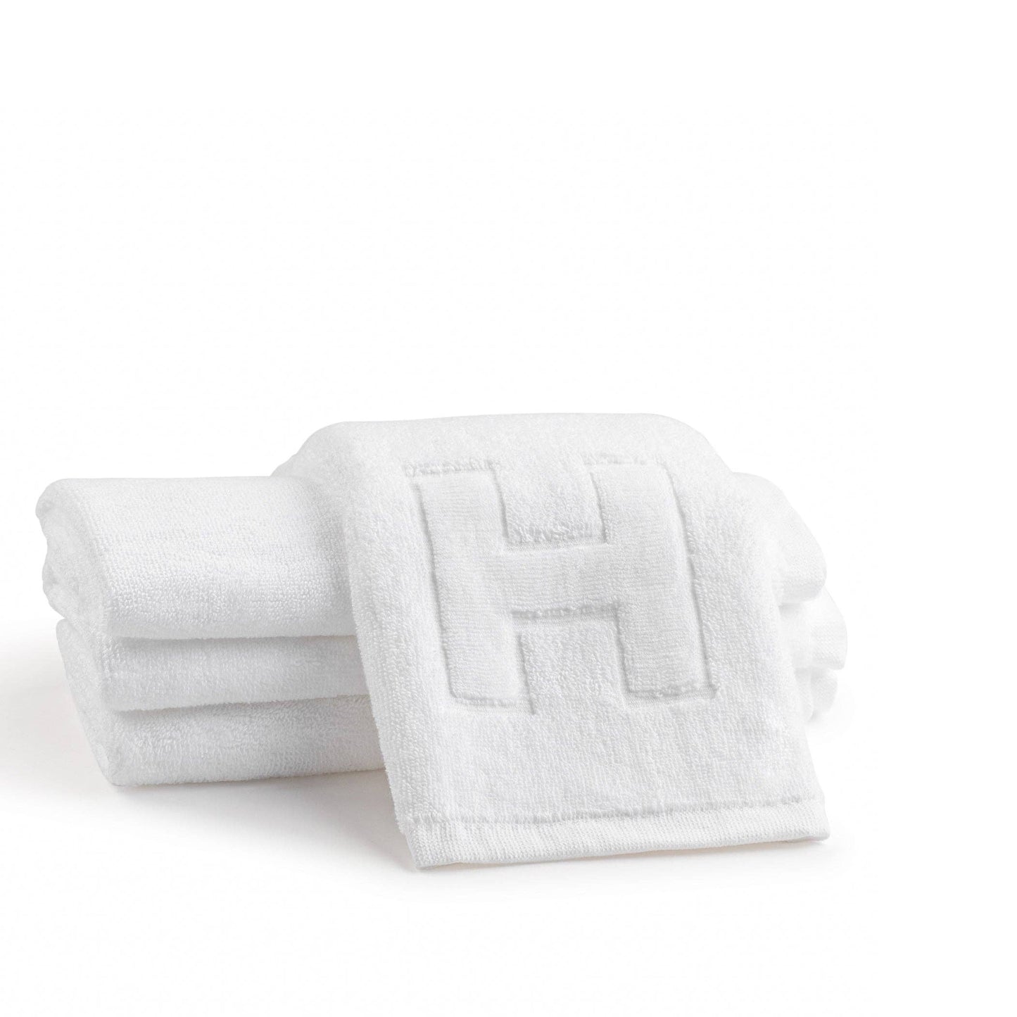 Elegant cotton finger towels with embossed initials, perfect for any room, gift-ready.
