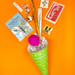 Valentine's Day Surprize Cornucopia filled with treasures like a Magic Butterfly®, crown, confetti pop, vintage toys, sweets, and more. A reusable cone for lasting memories.