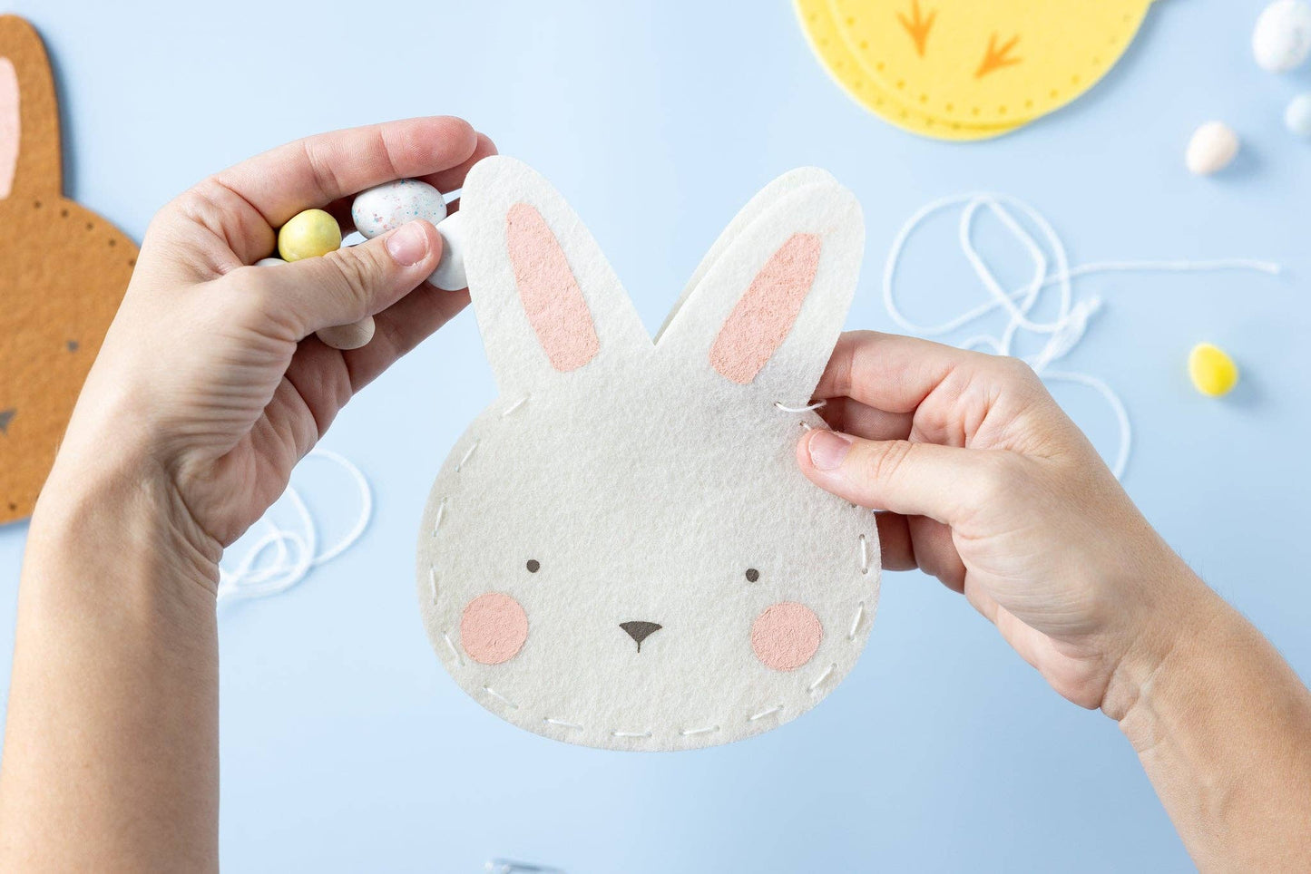 Felt Pouch Kit – 8 felt pieces & 4 yarn, makes 4 Easter-themed pouches (6"x7"), fun craft for kids.