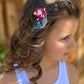 Cute glitter clips on fully lined glitter pinch clips, designed for kids’ hair. These sparkling hair accessories are perfect for everyday wear, adding a playful touch to any hairstyle. Fully lined for comfort, these clips feature a secure pinch mechanism, making them easy to use and ideal for young trendsetters.