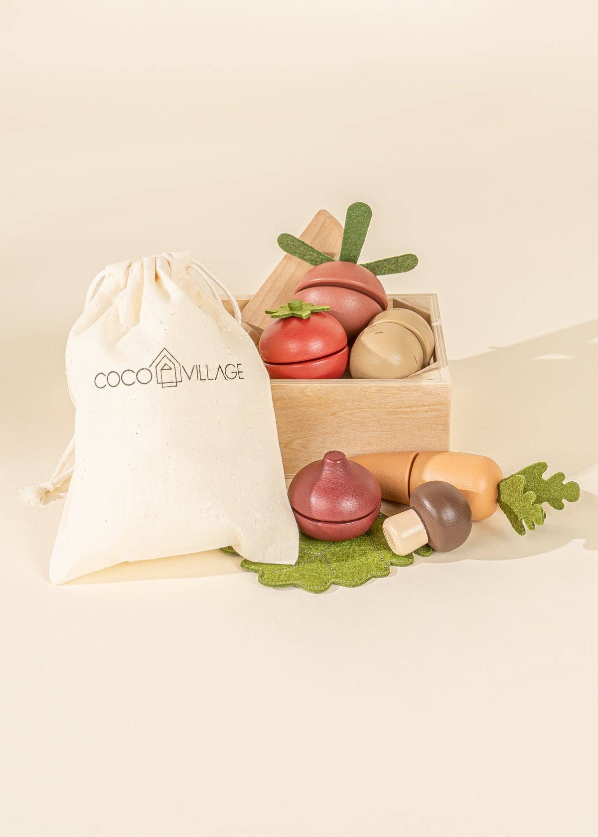 Wooden pretend food set with a knife, basket, and sliceable veggies to inspire creative playtime.