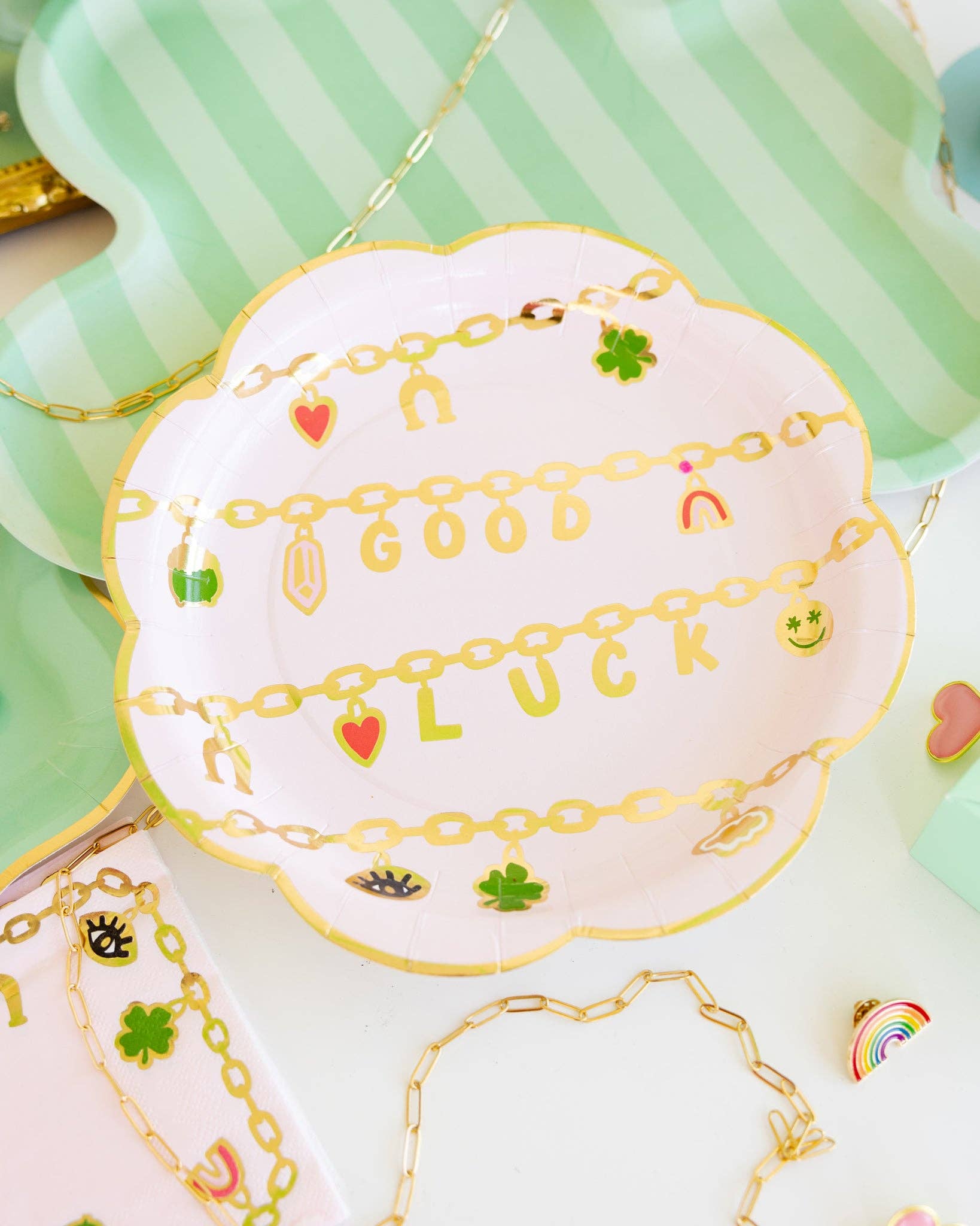 Set of 8 Gold Luck Scallop Plates – 10"x10", scalloped with gold foil, perfect for St. Patrick's Day celebrations.