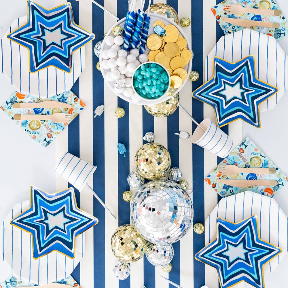 Star-shaped Hanukkah plates with gold and silver foil accents, 8-pack, 9 inches; festive design by Jordan Sondler for Daydream Society, perfect for celebrations.