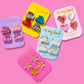 Colorful Mini Claw Clips set of 4 with confetti designs, pink & blue clips, perfect for everyday wear & gifts.