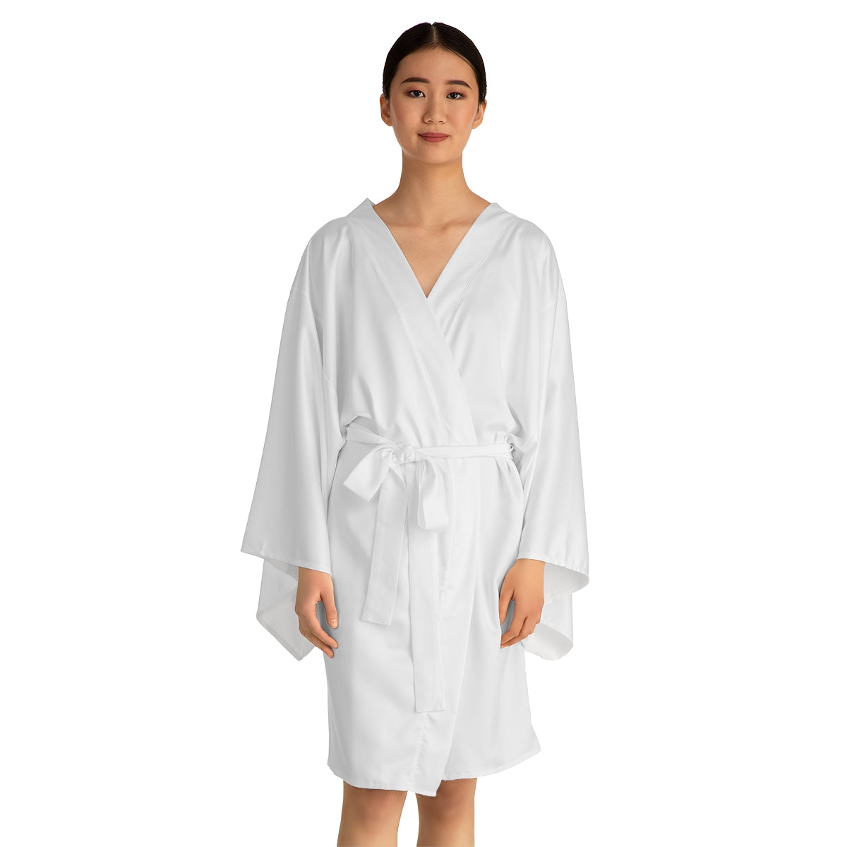 Beautiful mid-length kimono robe made from 100% polyester, offering a smooth and silky feel. Perfect for bridesmaids or girls looking for cozy comfort.