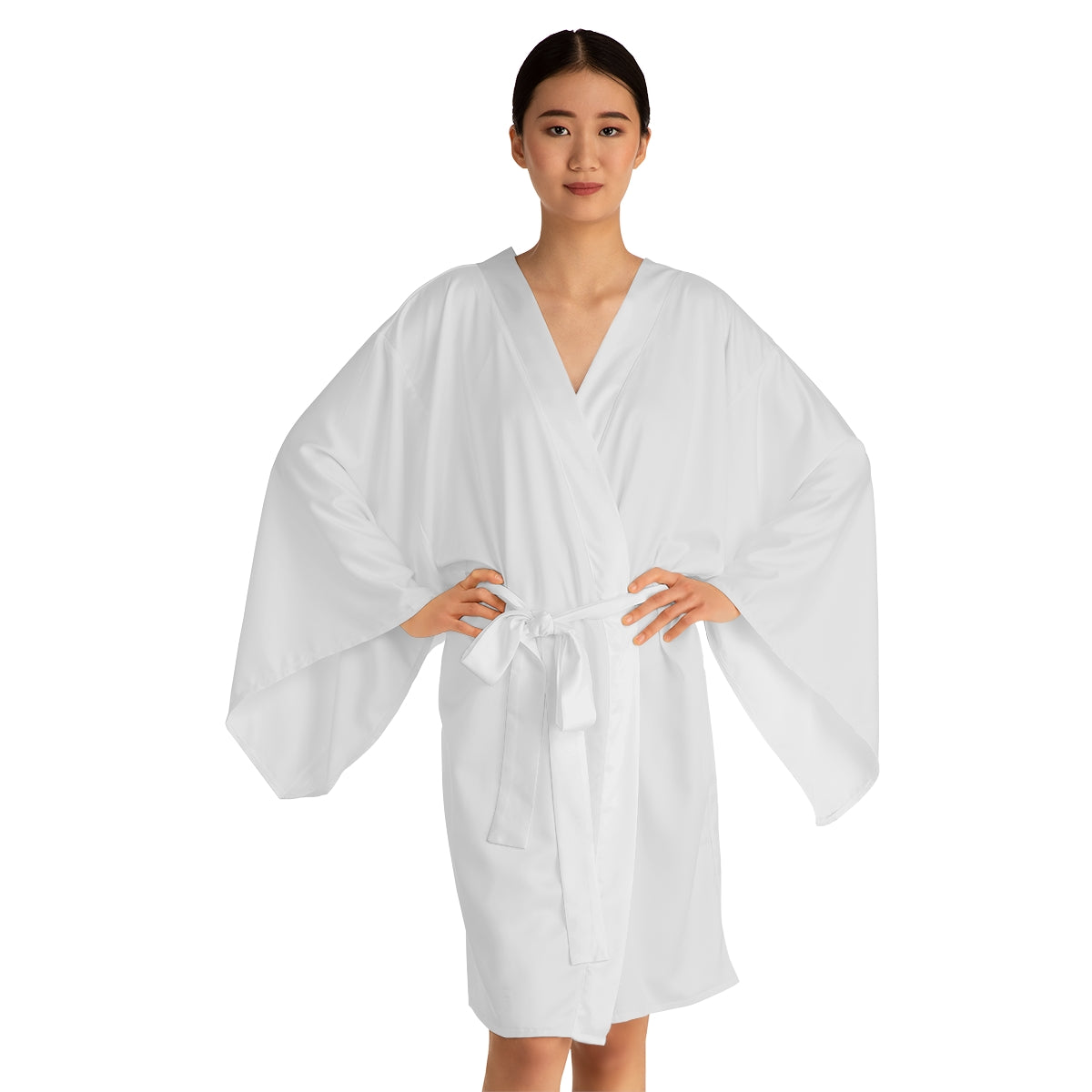 Beautiful mid-length kimono robe made from 100% polyester, offering a smooth and silky feel. Perfect for bridesmaids or girls looking for cozy comfort.