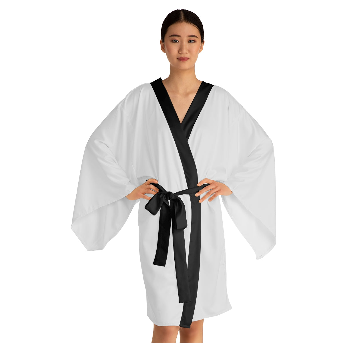 Beautiful mid-length kimono robe made from 100% polyester, offering a smooth and silky feel. Perfect for bridesmaids or girls looking for cozy comfort.