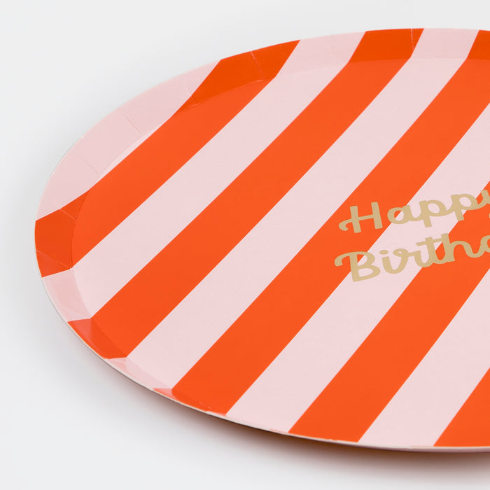 Bold striped birthday plates with gold foil 'Happy Birthday' text, pack of 8, 4 vibrant colors.