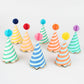 Bright striped party hats with honeycomb balls, gold foil details, and elastic cord, pack of 8."